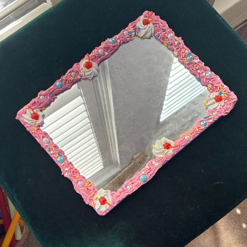 Pink Decorative Mirror that looks like a frosted Cake with Cherries